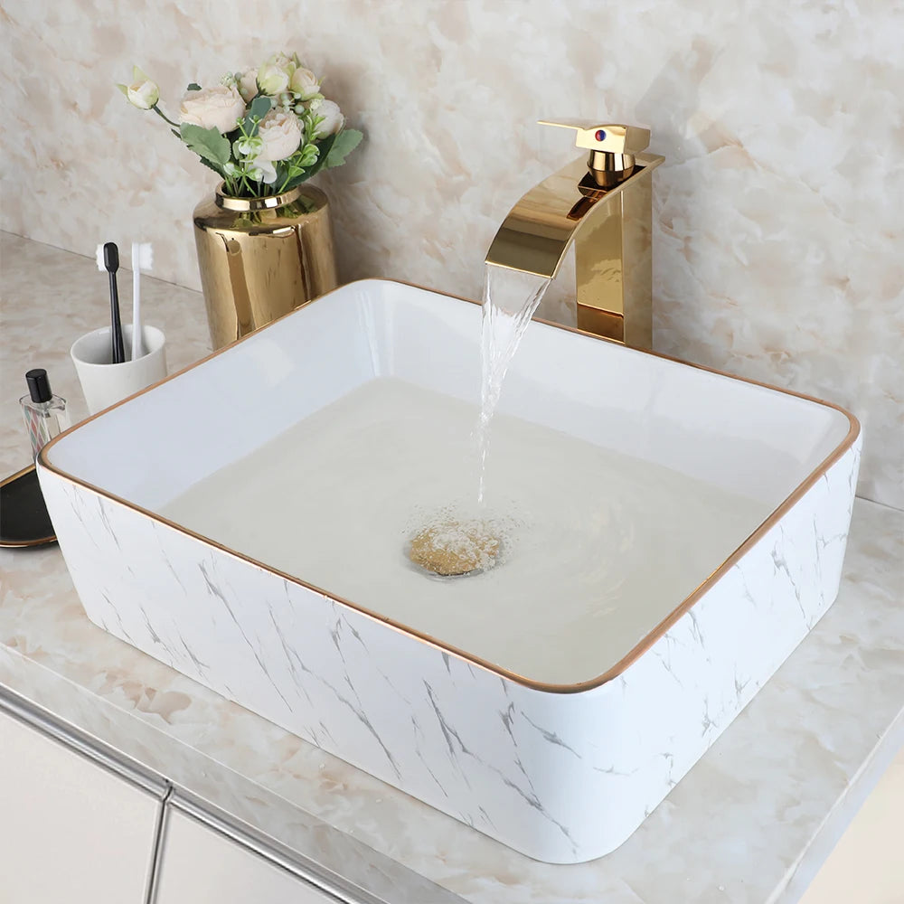 White Marbled Rectangular Ceramic Bathroom Vessel Sink with Gold Faucet